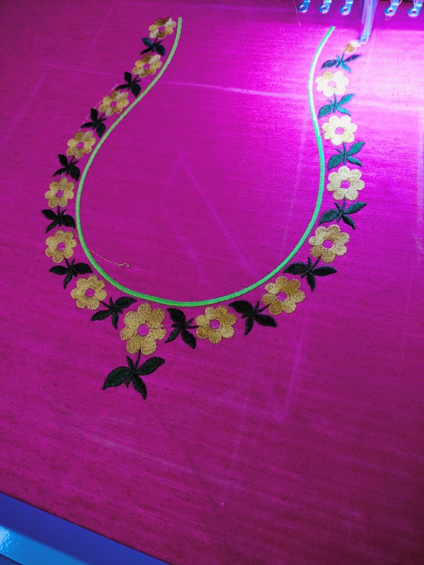 Floral neckline embroidery in gold and black thread