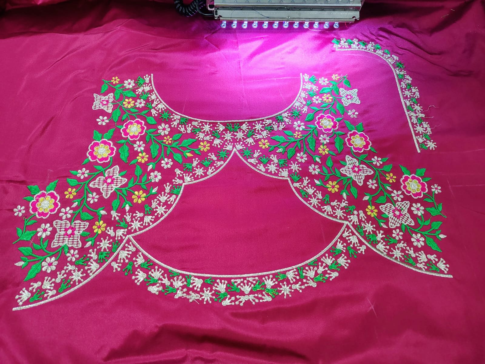 Scalloped floral embroidery yoke on magenta satin